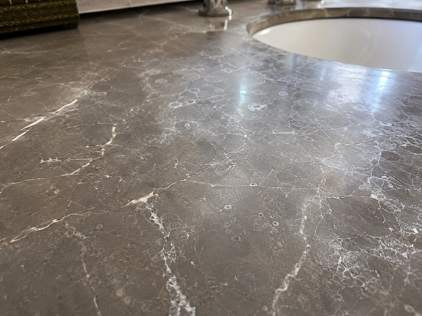 image showing a close-up of dull, etched marble before treatment